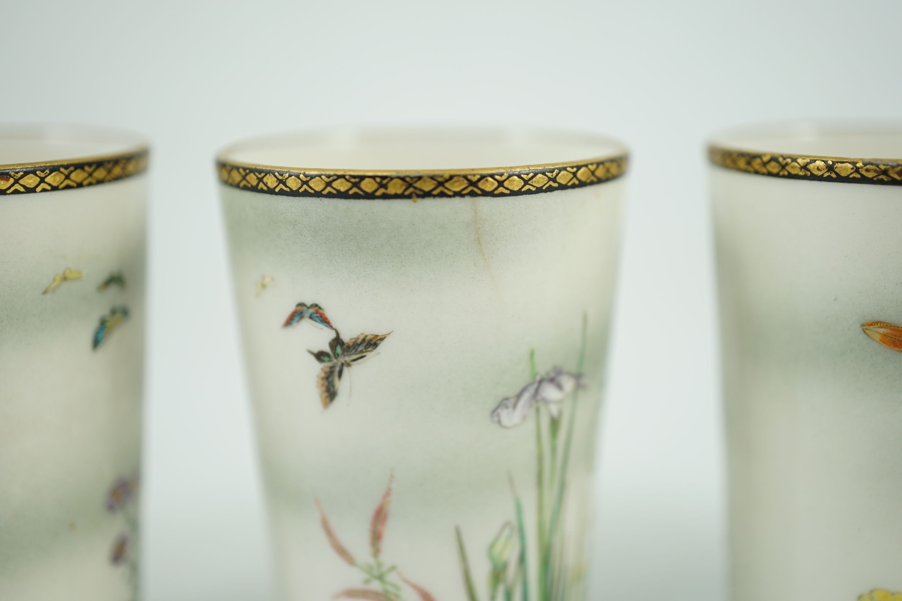 A set of four Japanese porcelain small cups, by Kinkozan, Meiji period, 6.2cm high
